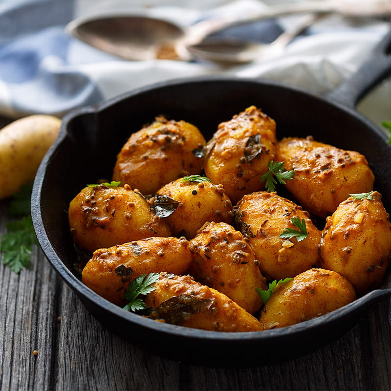 Gevulde kerrieaardappelen